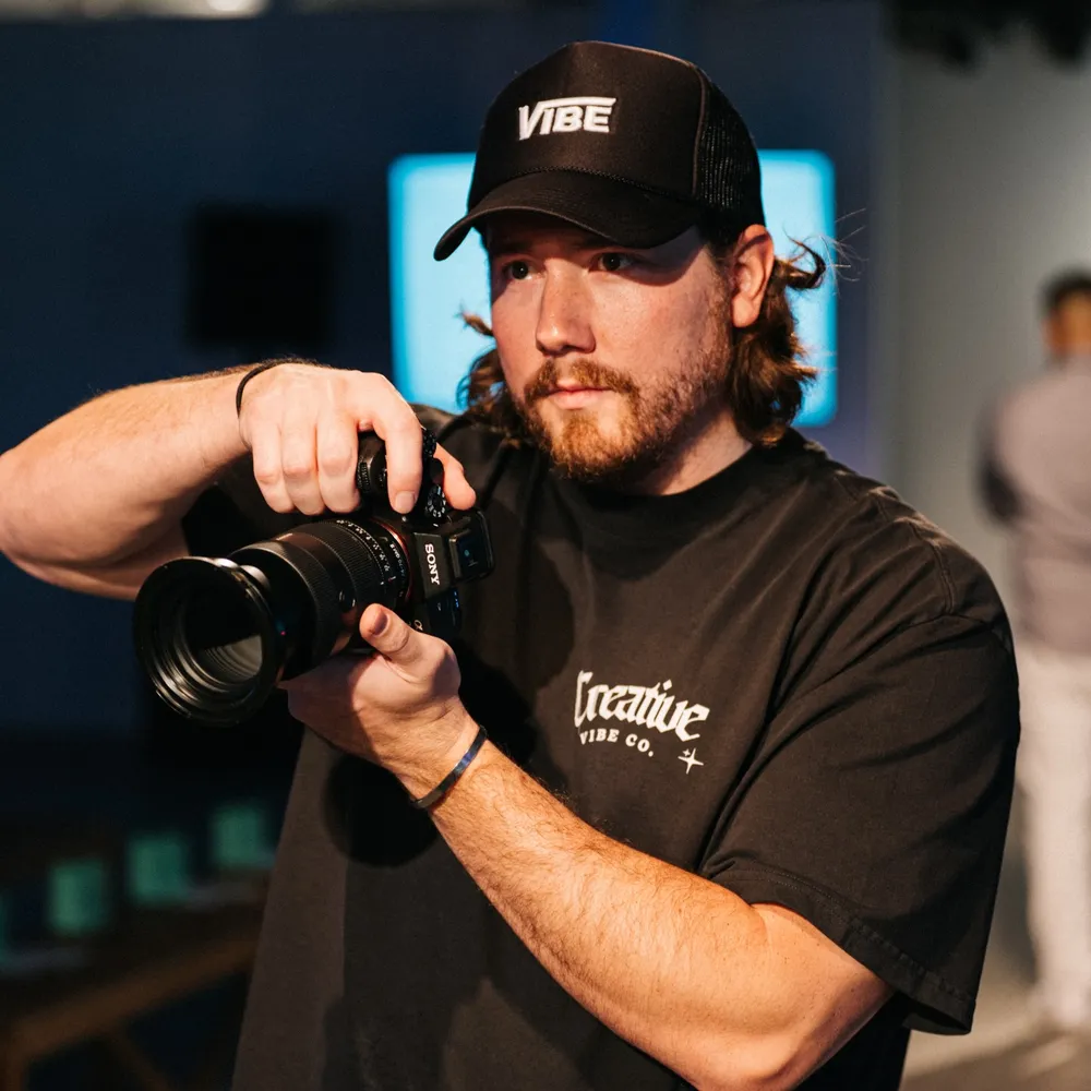 Alex shooting with a camera