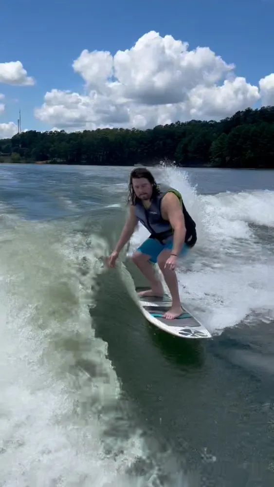 Alex wakesurfing on the lake